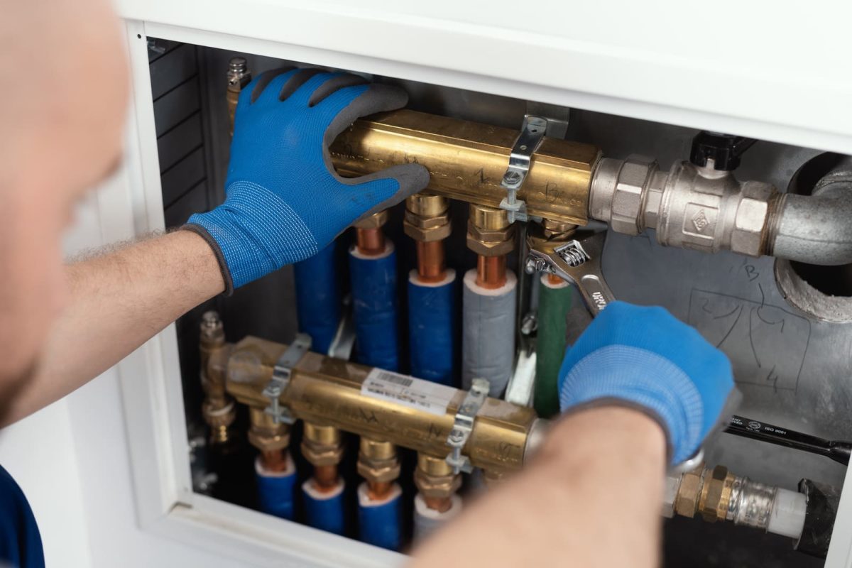 professional-plumber-installing-plumbing-manifolds-2025-01-08-07-55-13-utc